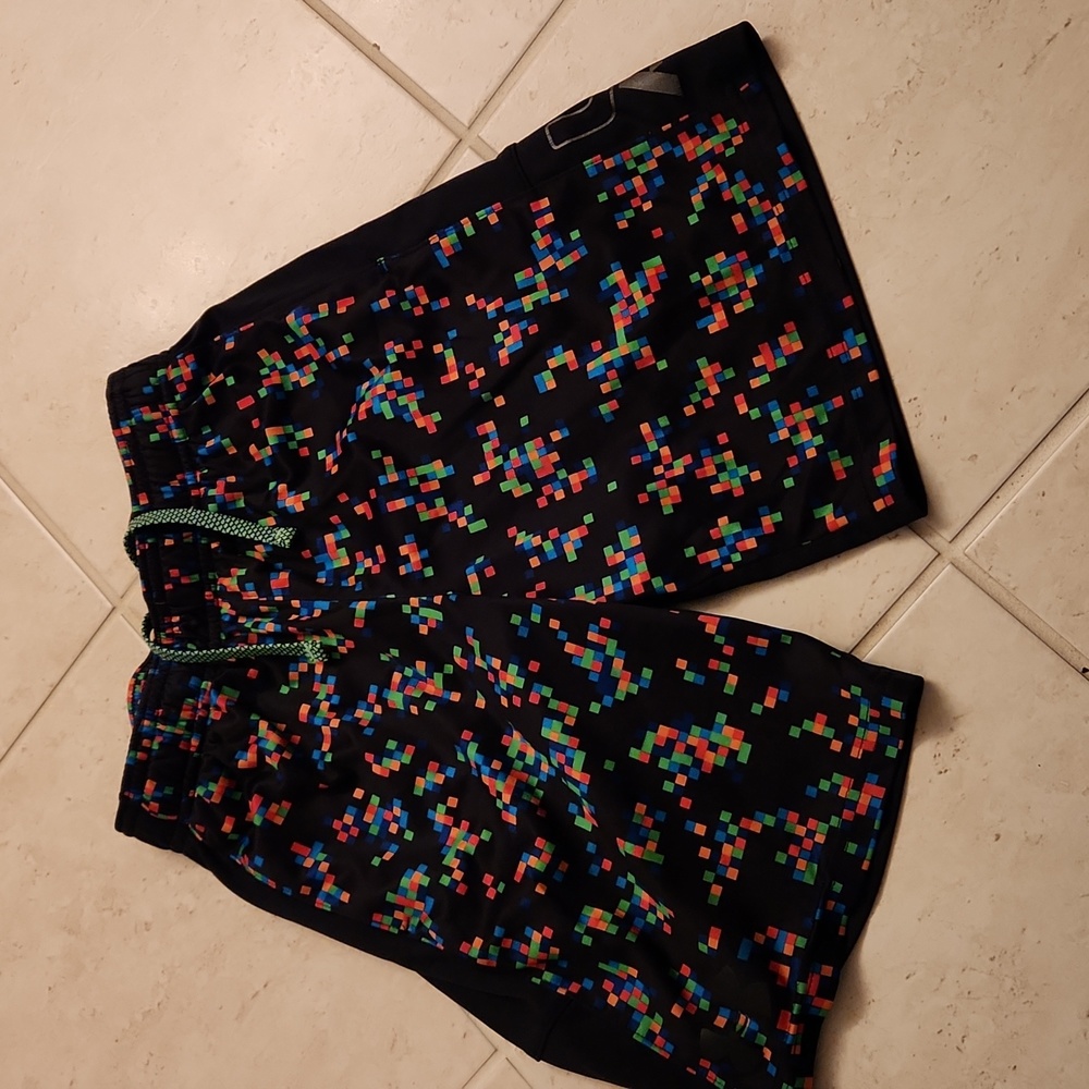Under Armour boys shorts.  Size S. Excellent condition. Black.